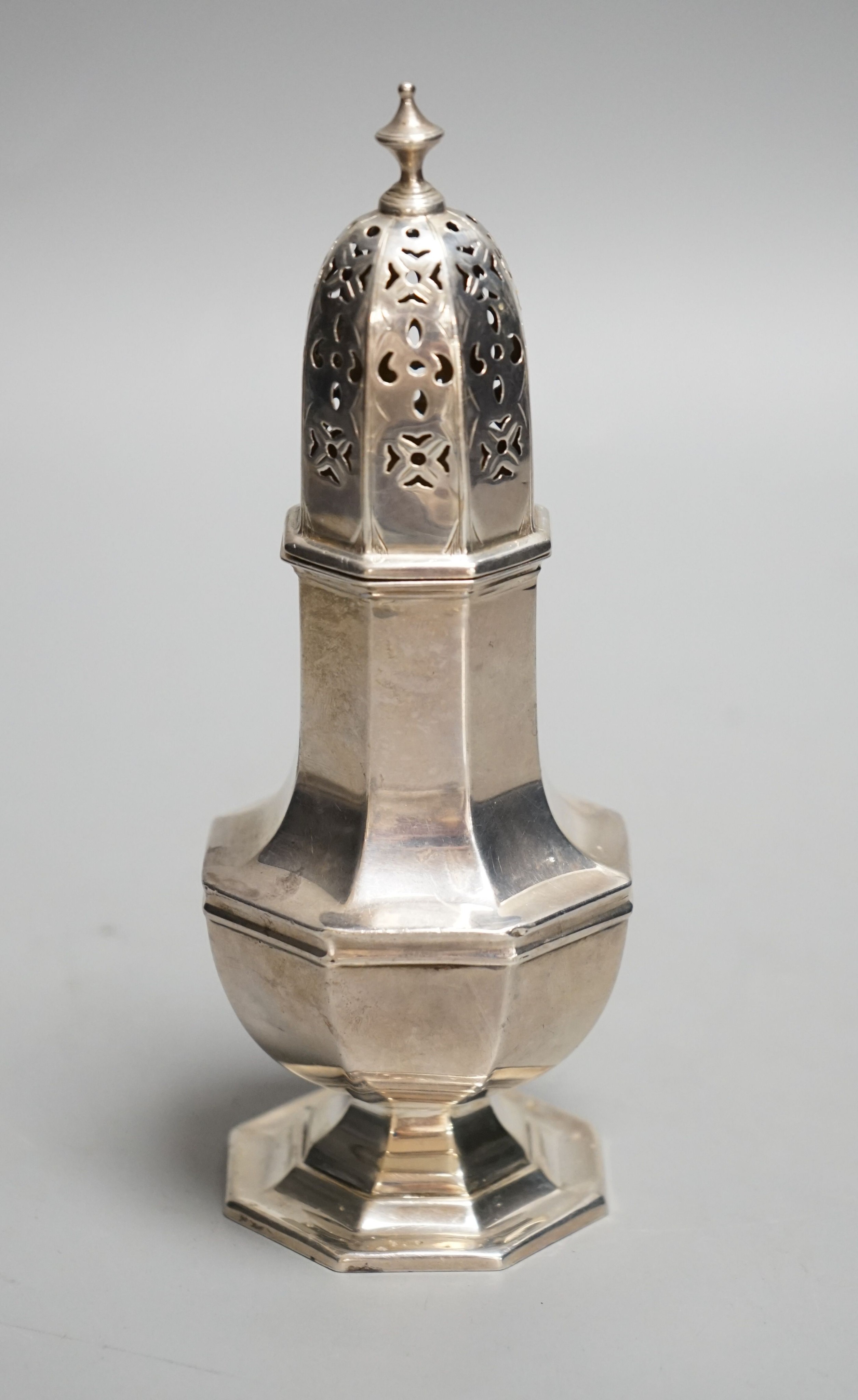 A George V silver octagonal sugar caster, Birmingham, 1910, 15.4cm, 93 grams.